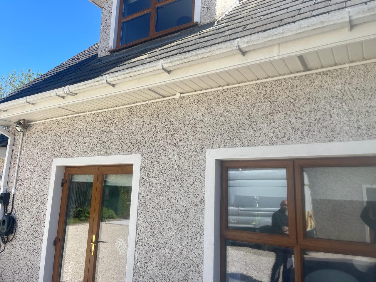 House exterior with EV charger supply box