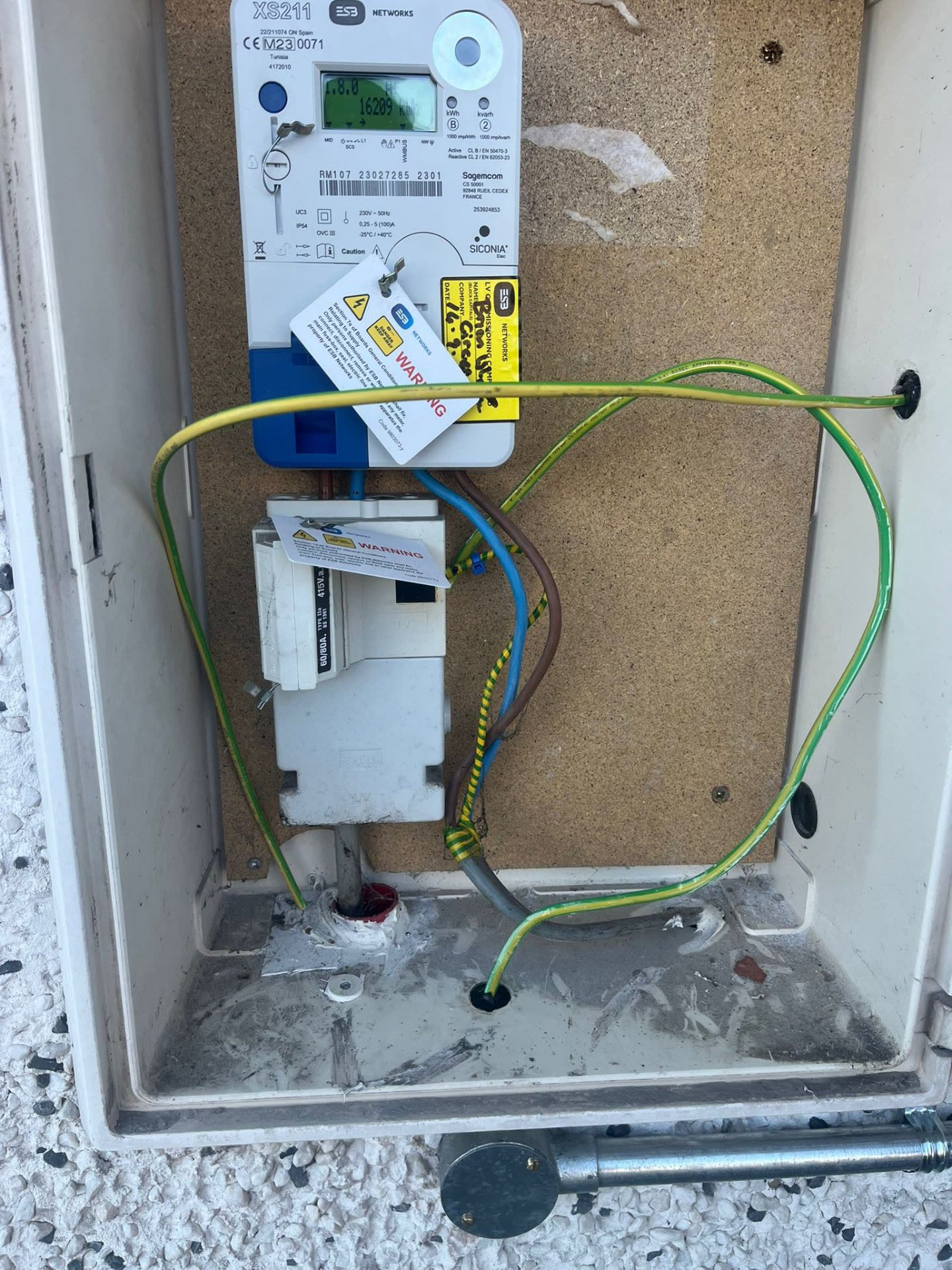 ESB meter and earthing wiring inside enclosure