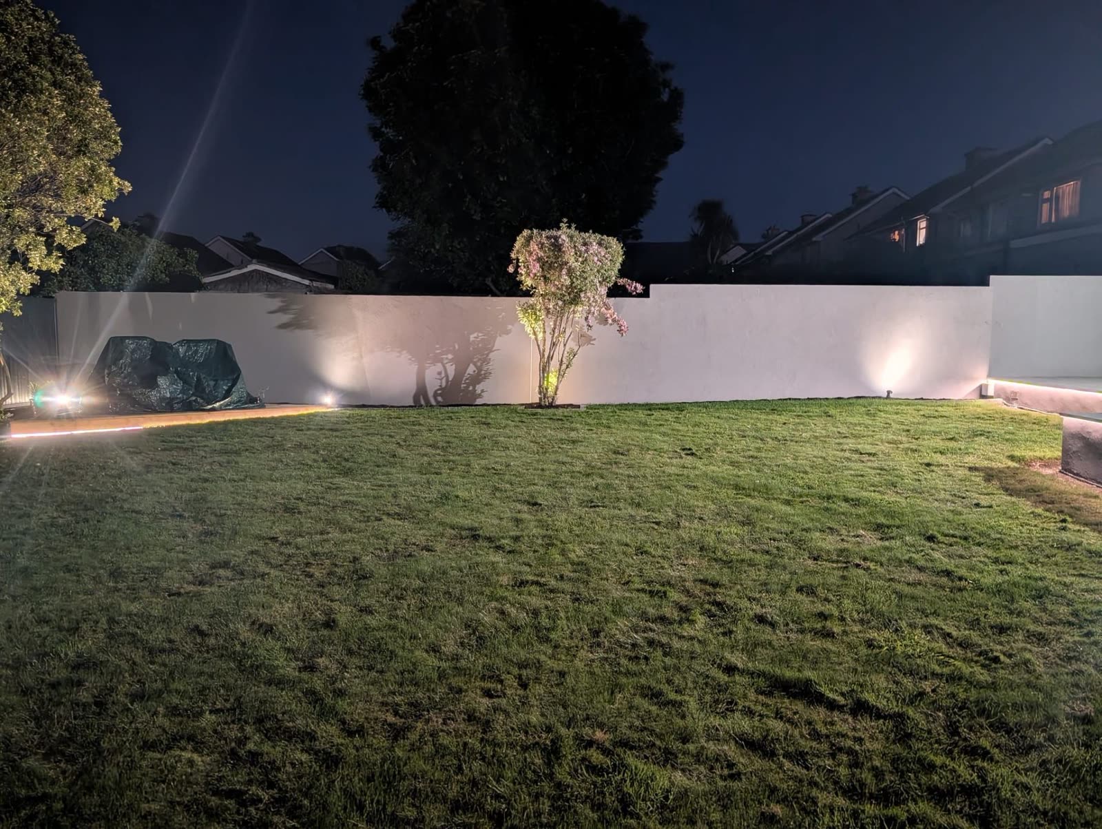 Garden perimeter wall lighting at night