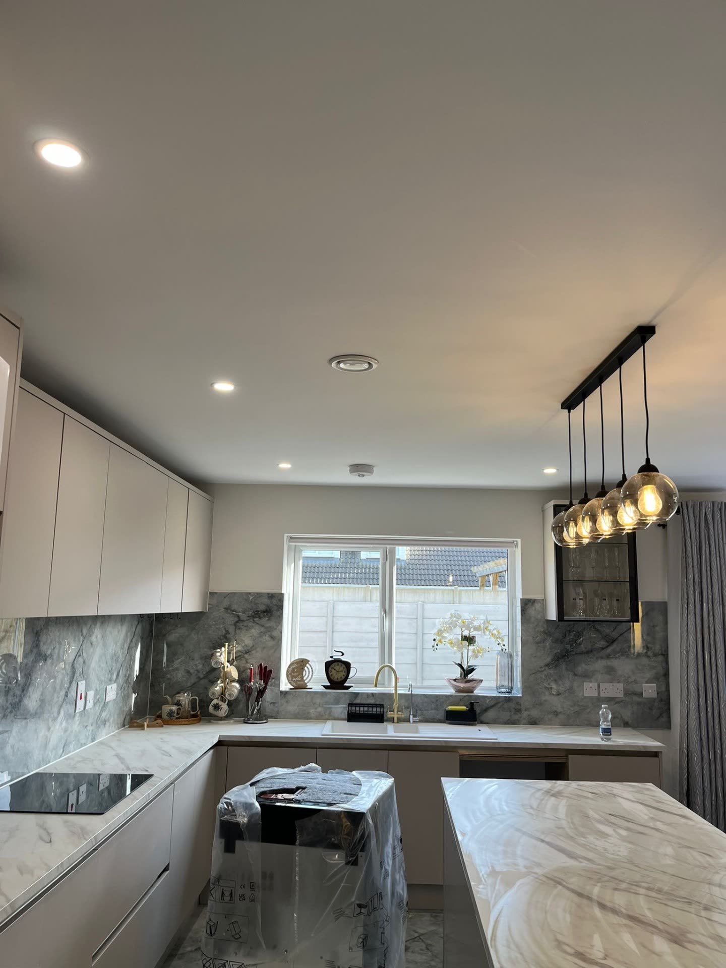 Kitchen downlights and pendant cluster