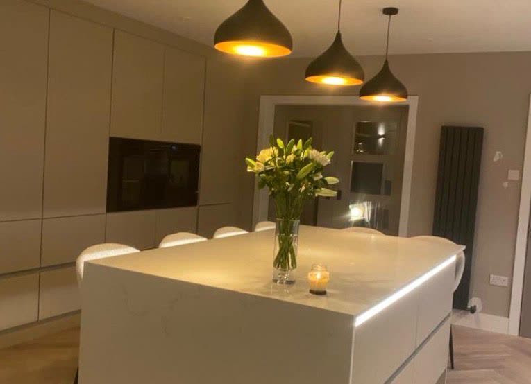 Kitchen island with pendant trio lighting