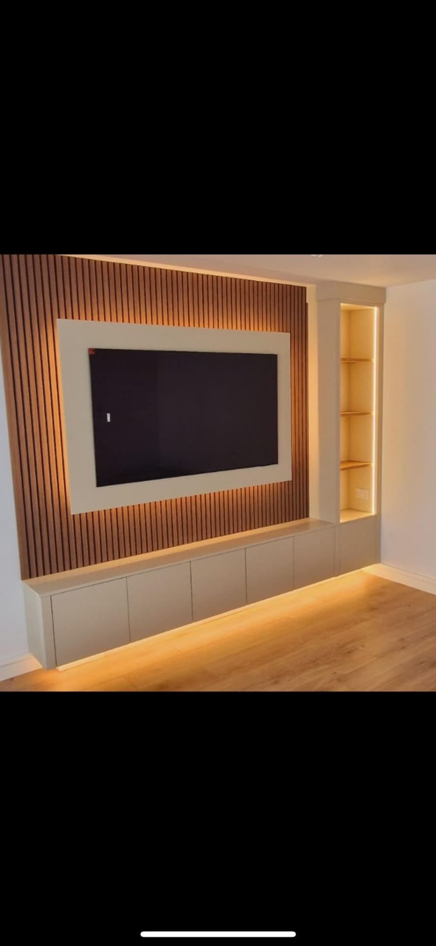 Media wall with LED accent lighting